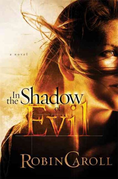 In the shadow of evil : A Novel / Robin Caroll.
