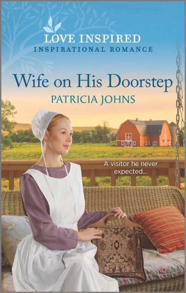 Wife on his doorstep / Patricia Johns.